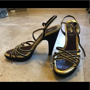 Beautiful Prada heel gold and black,